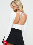 back view of model wearing Princess Polly Xander Long Sleeve Bodysuit White Full Sleeves 