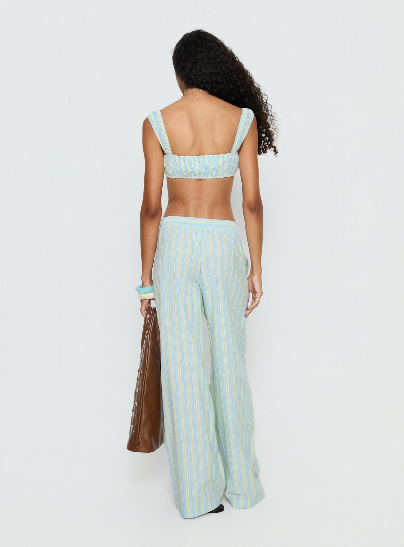 back view of model wearing Princess Polly Talyssa Elasticated Waist Pants Blue Stripe Mid Rise Pants 