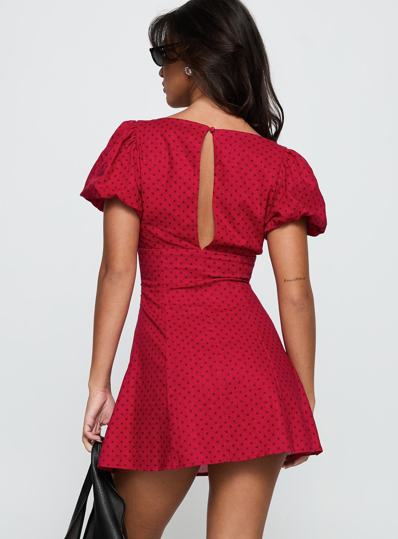 back view of model wearing Princess Polly Beloved Puff Sleeve Linen Blend Mini Dress Red Polka Plunger 
