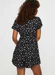    Romper, floral print V-neckline, fixed buttons on front Invisible zip fastening at back