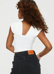 Off the shoulder top Twist detail at bust, cap sleeve Good stretch, unlined 
