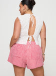 back view of model wearing Princess Polly Beach House Shorts Red / White Gingham Curve High Waisted Shorts 