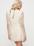 back view of model wearing Princess Polly Kael Long Sleeve Mini Dress Cream Scoop Neck 