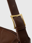 Faux leather bag  Adjustable shoulder strap, gold-toned buckle, single internal pocket with zip fastening, fully lined