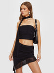 Matching two-piece set, mesh material Strapless crop top, ruched bust, ruffle detail Mid-rise mini skirt, ruched waistband, ruffle detail Good stretch, fully lined Princess Polly Lower Impact