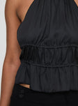 Front view of model wearing  front Princess Polly Sleeveless High Neck  Legacy Halter Top Onyx