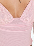 Pink crop top Mesh material Adjustable shoulder straps V neckline Good stretch Fully lined 