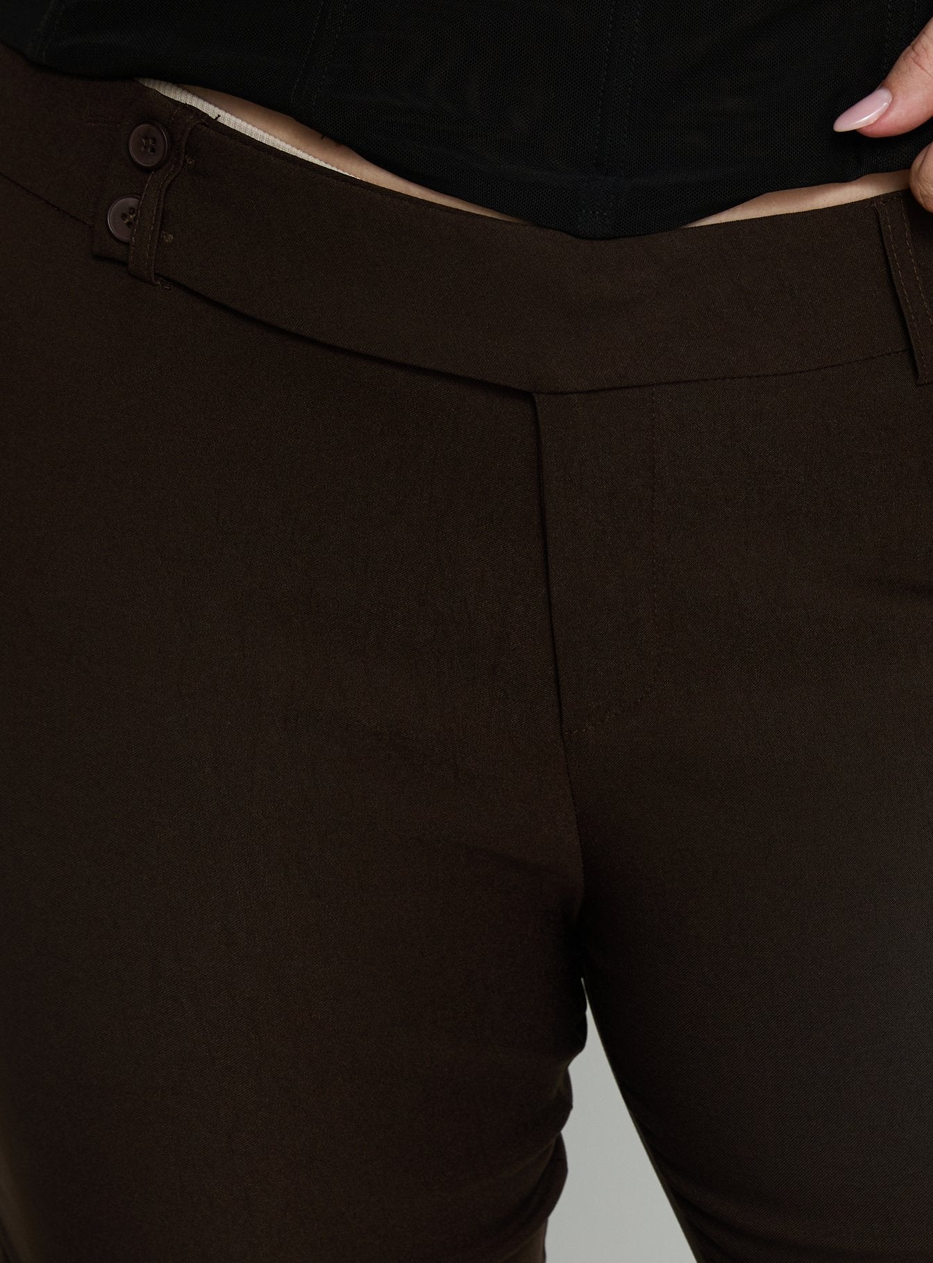 back view of model wearing Princess Polly Kinkirk Flared Pants Chocolate Curve Mid Rise Pants 