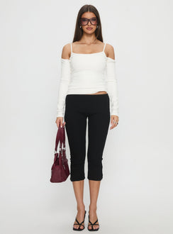 front view of model wearing Princess Polly Baseline Rib Capri Pants Black Tall Mid Rise Pants 