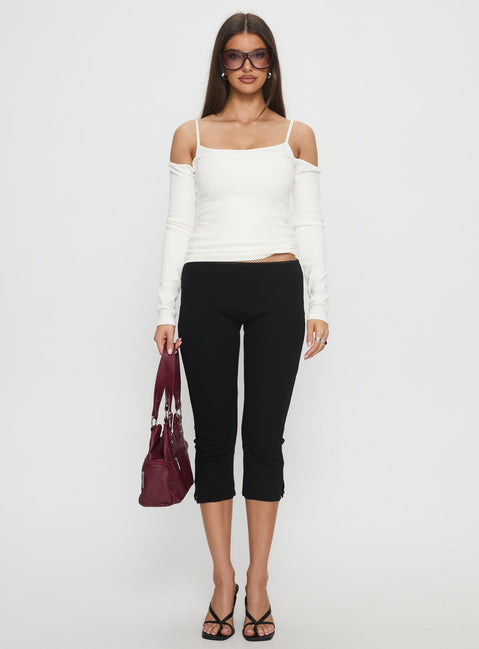 front view of model wearing Princess Polly Baseline Rib Capri Pants Black Tall Mid Rise Pants 