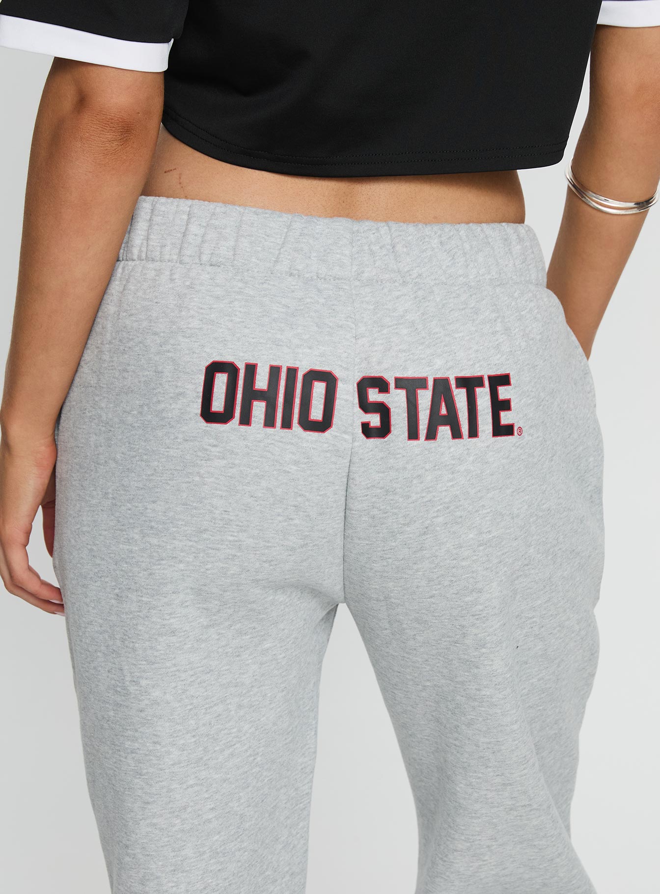 back view of model wearing Princess Polly Ohio State Basic Sweatpants Grey Mid Rise Pants 