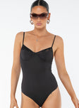 front view of model wearing Princess Polly Dalsi Bodysuit Black Sleeveless V-Neck 