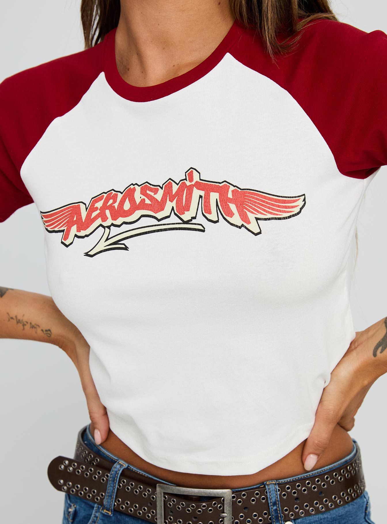 back view of model wearing Princess Polly Let Rock Rule Graphic Top White / Red Short Sleeves Crew Neck 