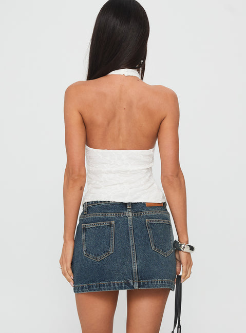 back view of model wearing Princess Polly Nickei Denim Mini Skirt Washed Blue Tall Mini Skirts 