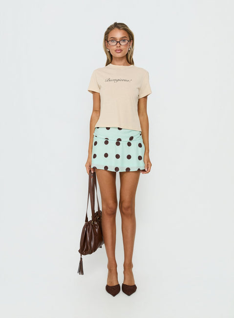   side view of model wearing Princess Polly Elicia Ruched Mini Skirt Mint / Chocolate Polka Dot Mini Skirts 