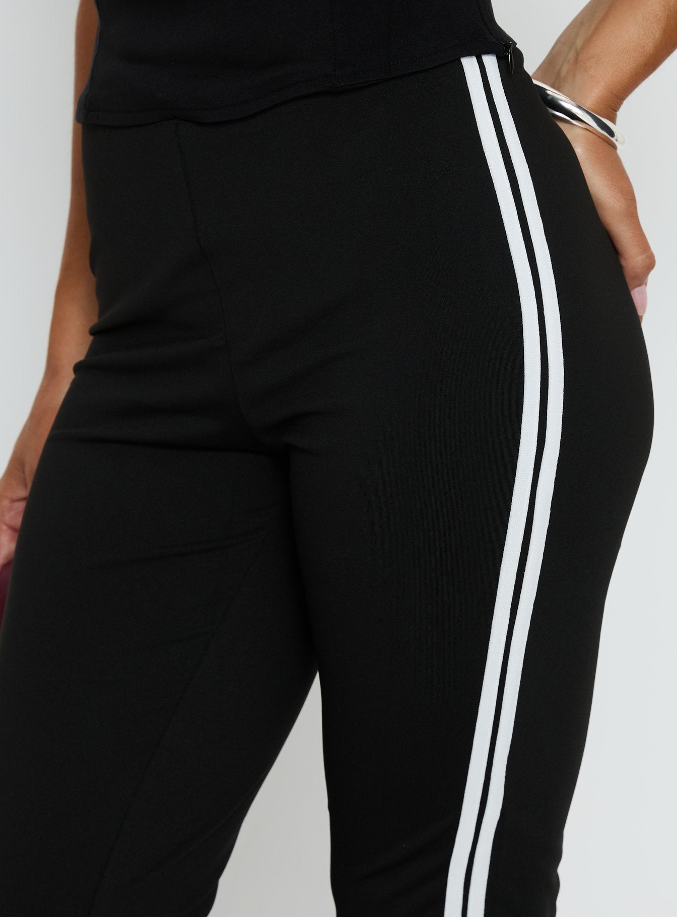 back view of model wearing Princess Polly Jobey Capri Pants Black High Rise Pants 