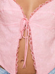 Pink broderie anglaise Fixed shoulder straps, v-neckline, tie fastening at front, split hem