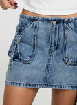 Denim mini skirt Cargo style, twin hip pockets, button & zip fastening, belt looped waist Non-stretch material, unlined  Princess Polly Lower Impact 