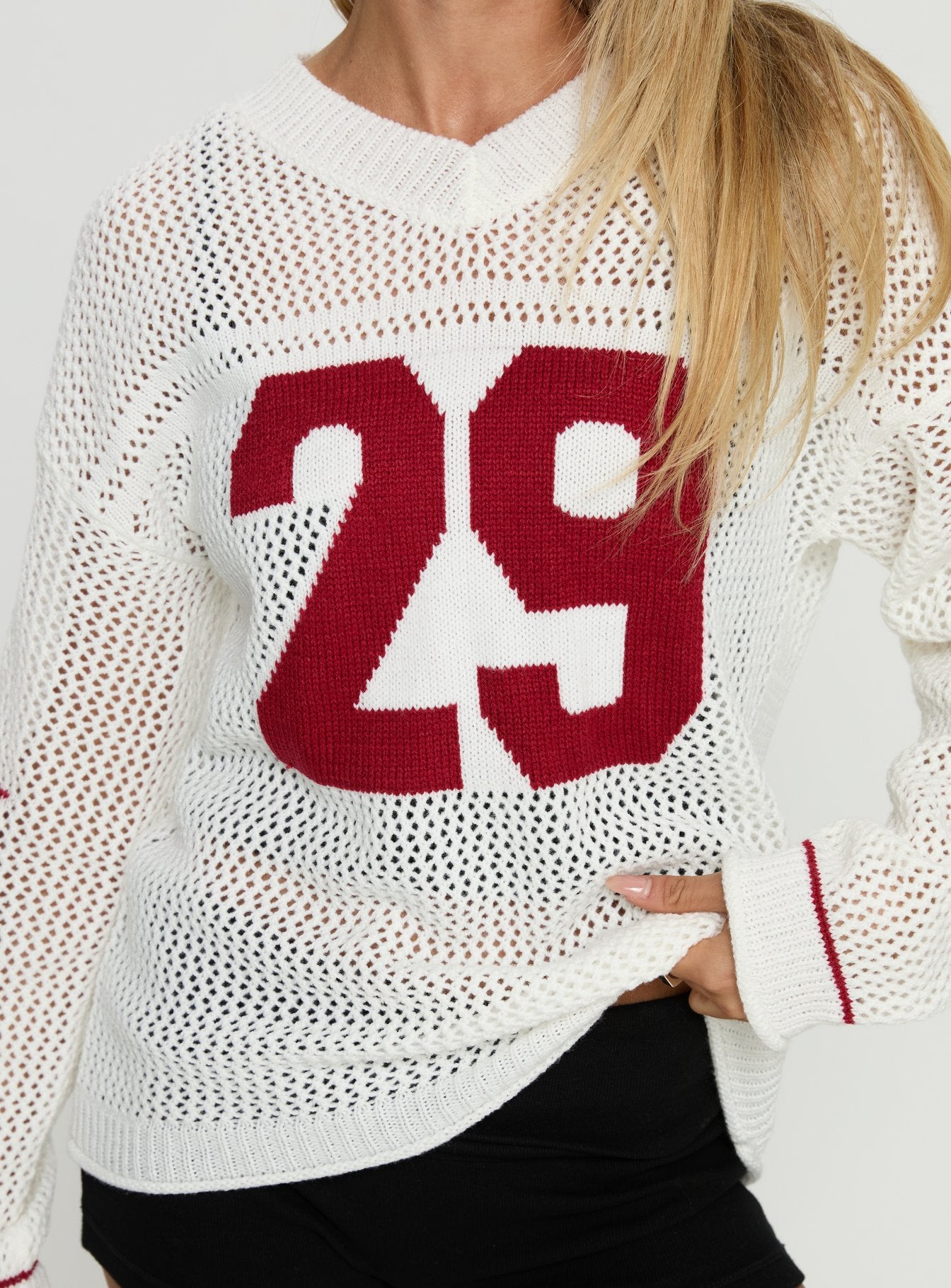 back view of model wearing Princess Polly Korrin V Neck Graphic Knit Sweater White 