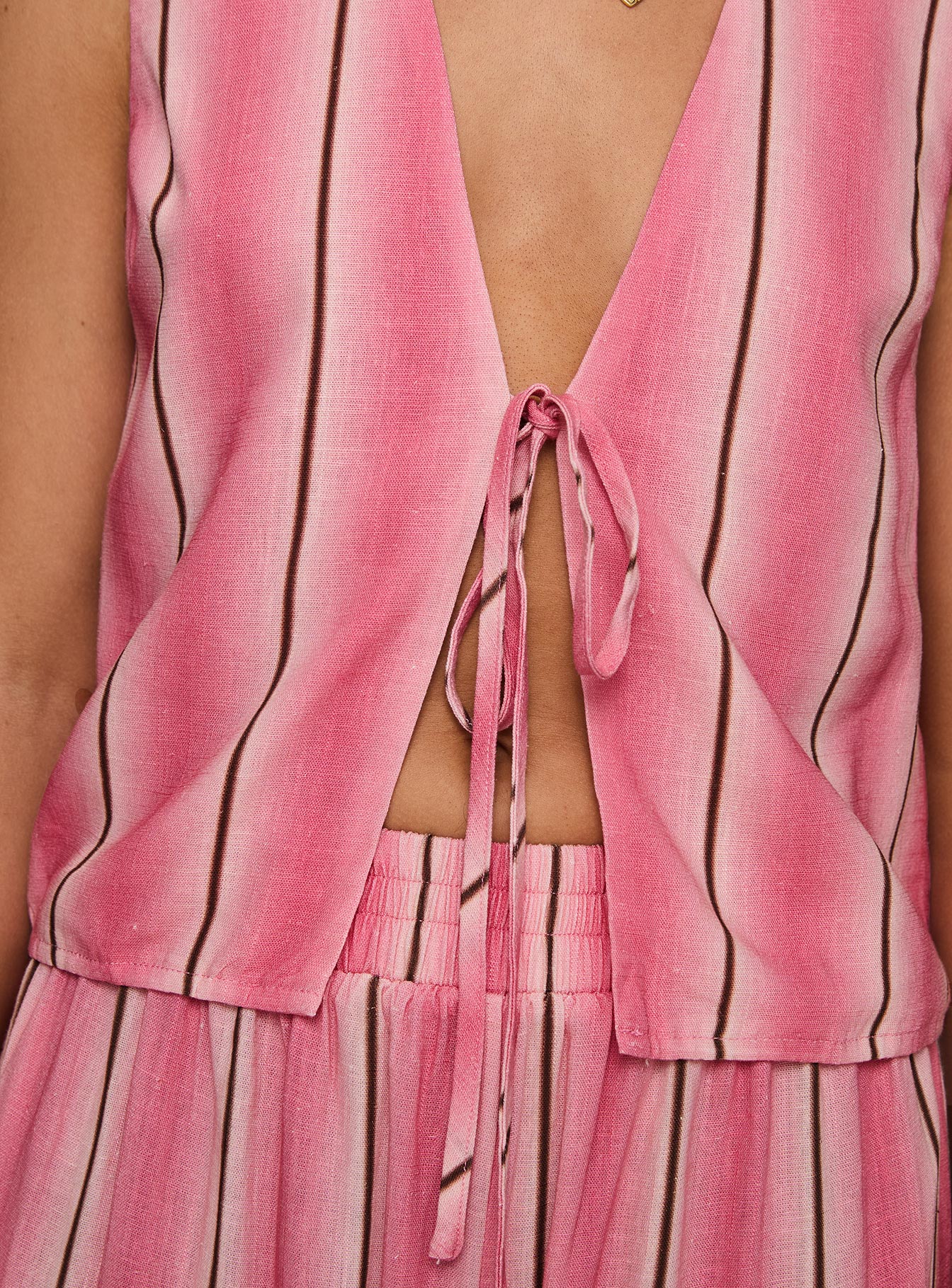 back view of model wearing Princess Polly Gentle Vest Top Pink Sleeveless Plunger 