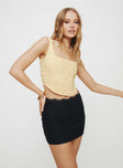 Front view of model wearing  front Princess Polly Sleeveless Square Neck  Macklin Top Beige