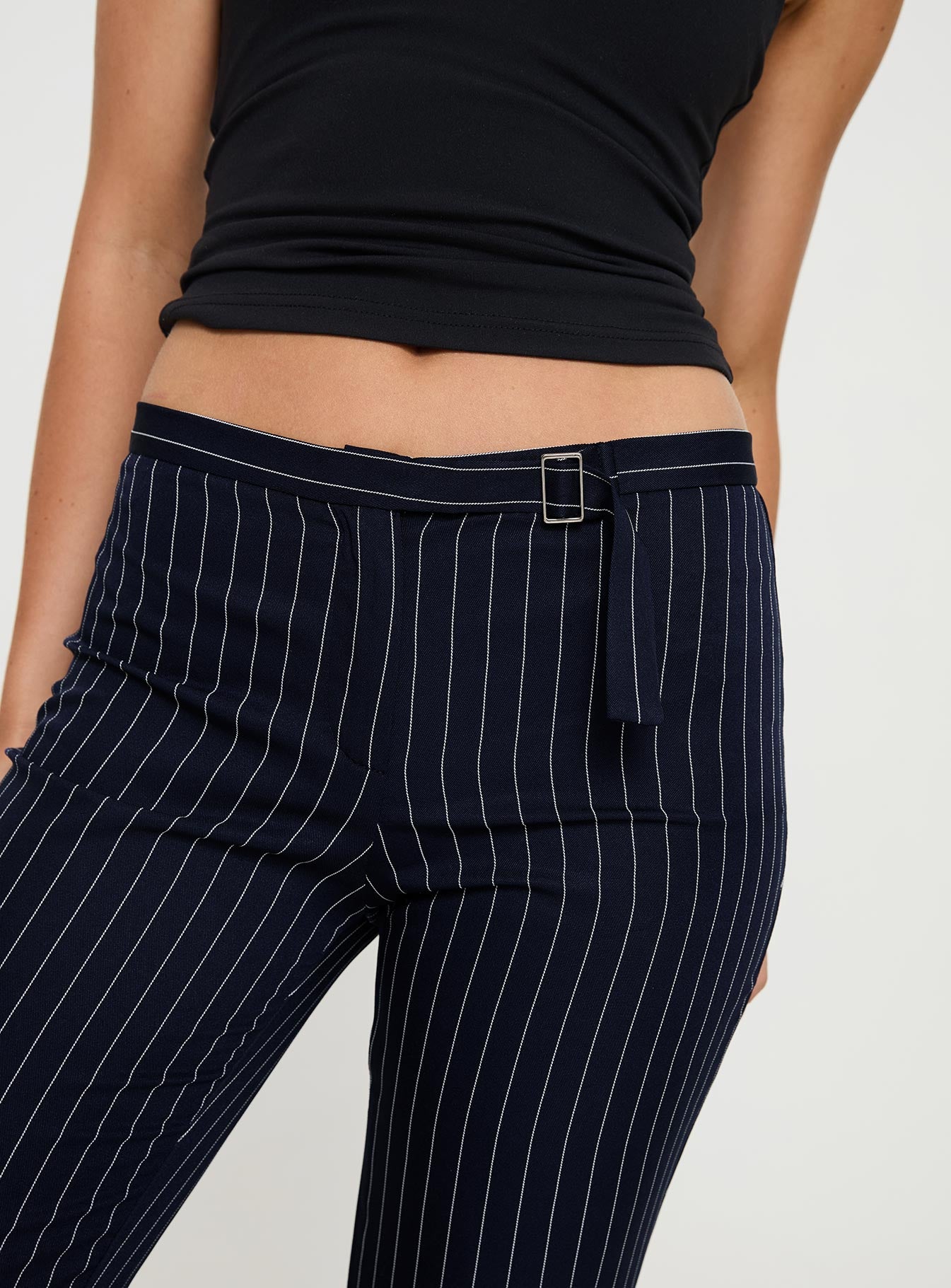 back view of model wearing Princess Polly No One Low Waist Pinstripe Pants Navy Mid Rise 