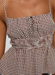 Gingham print top Adjustable shoulder straps, scooped neckline, shirred band Non-stretch material, lined bust