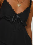 Top  Elasticated straps, lace trim, bow detail at bust, slightly sheer, invisible zip fastening Non stretch, double lined 