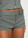 Low rise shorts Zip fastening, fixed belt detail with silver-toned buckle fastening Good stretch, unlined 
