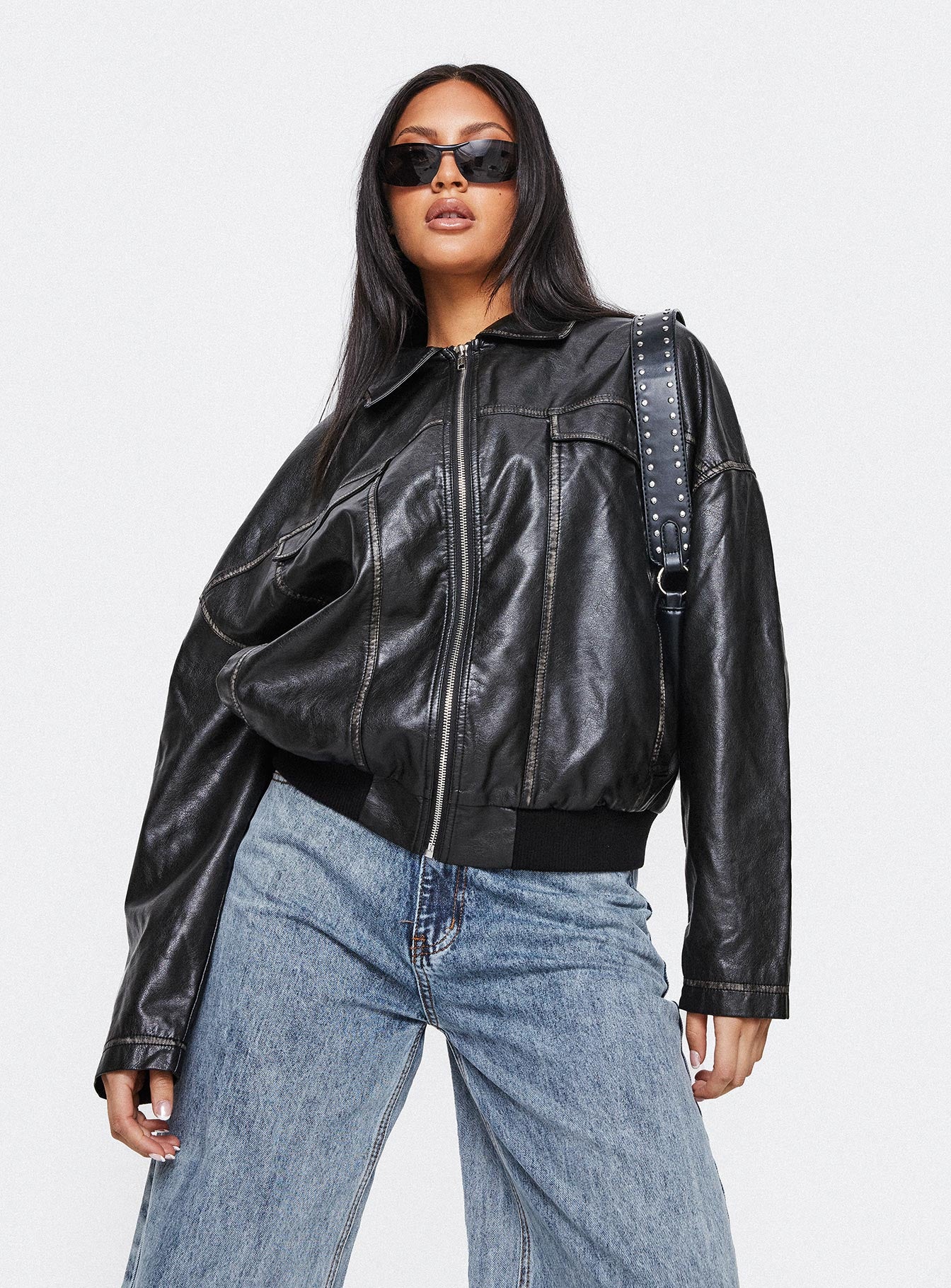 Washed PU jacket Classic collar, silver-toned hardware, zip fastening at front, twin chest pockets, elasticated waistband