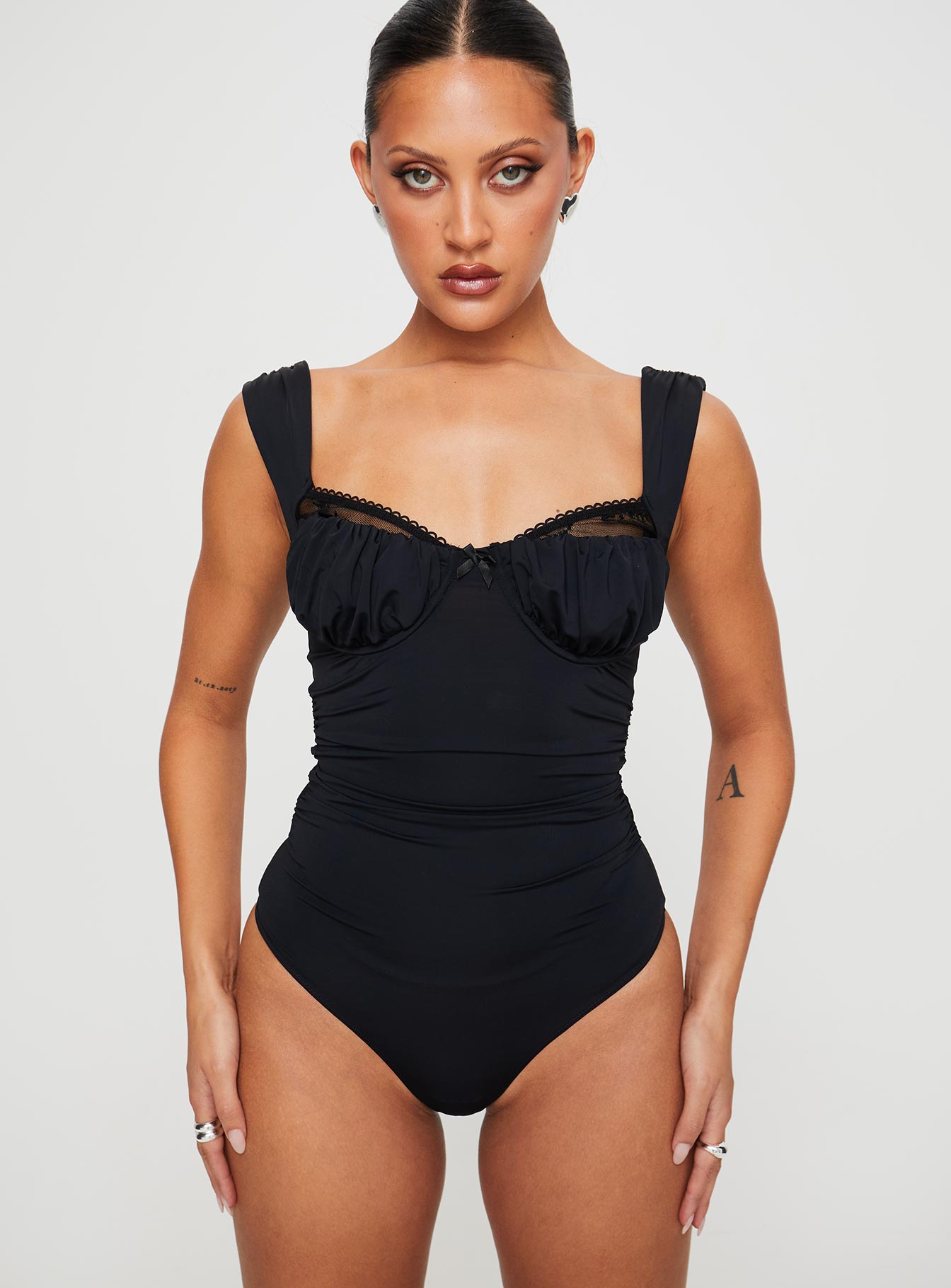 front view of model wearing Princess Polly Weller Bodysuit Black Sleeveless 