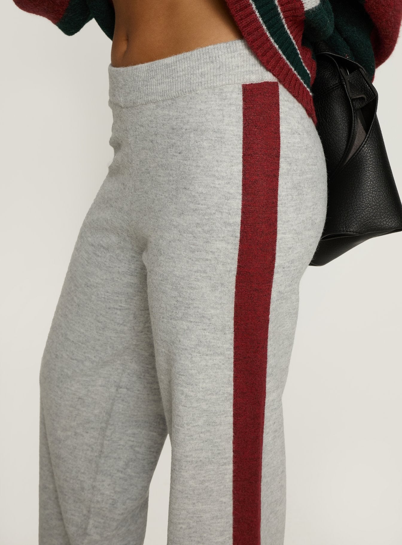 side view of model wearing Princess Polly Brandyce Straight Leg Knit Pants Grey / Red High Rise Pants 