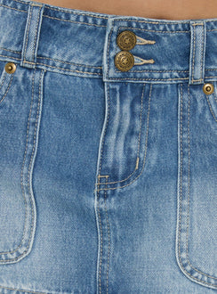 Crafted from the Moving Fast Denim Mini Skirt Mid Blue Wash in womens-skirts with mini length product Princess Polly