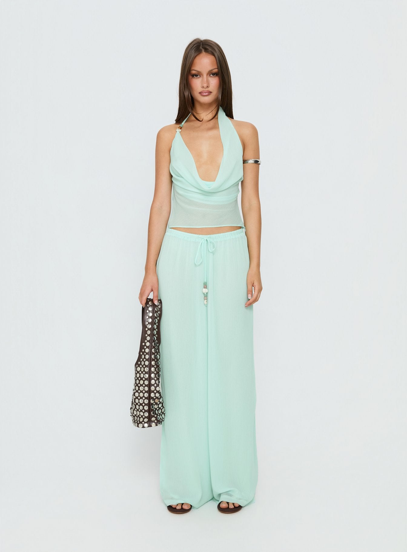 side view of model wearing Princess Polly Distinction Chiffon Pants Aqua Mid Rise Pants 