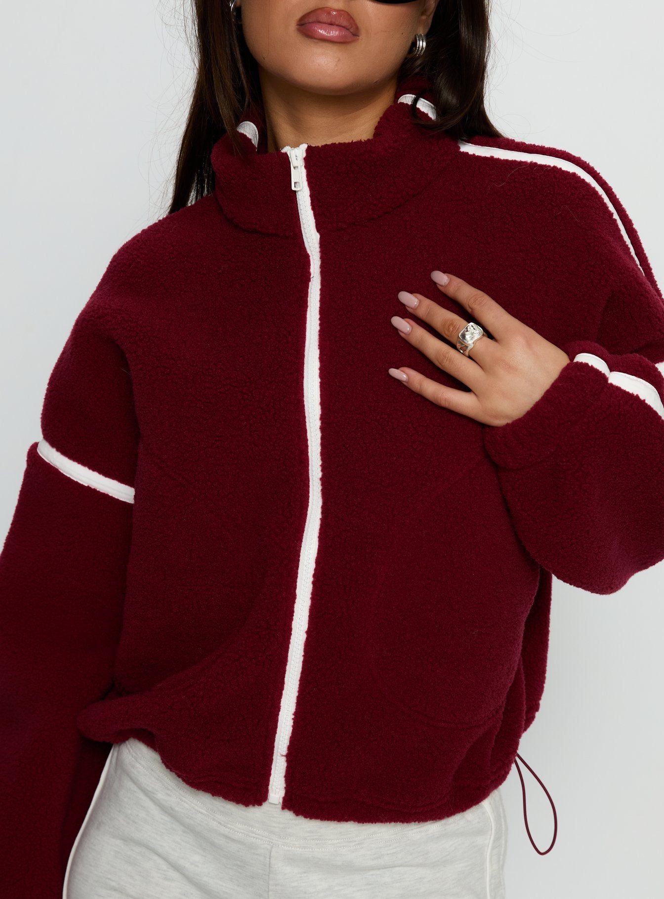 front view of model wearing Princess Polly Sammee Polar Fleece Contrast Zip Through Jacket Red Cropped Jumpers 