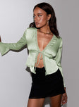 Long sleeve top, silky material Open front, tie fastening, ruched bust, lace detailing, flared cuff