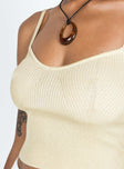 Top Ribbed knit material Adjustable shoulder straps V neckline Good stretch Unlined 