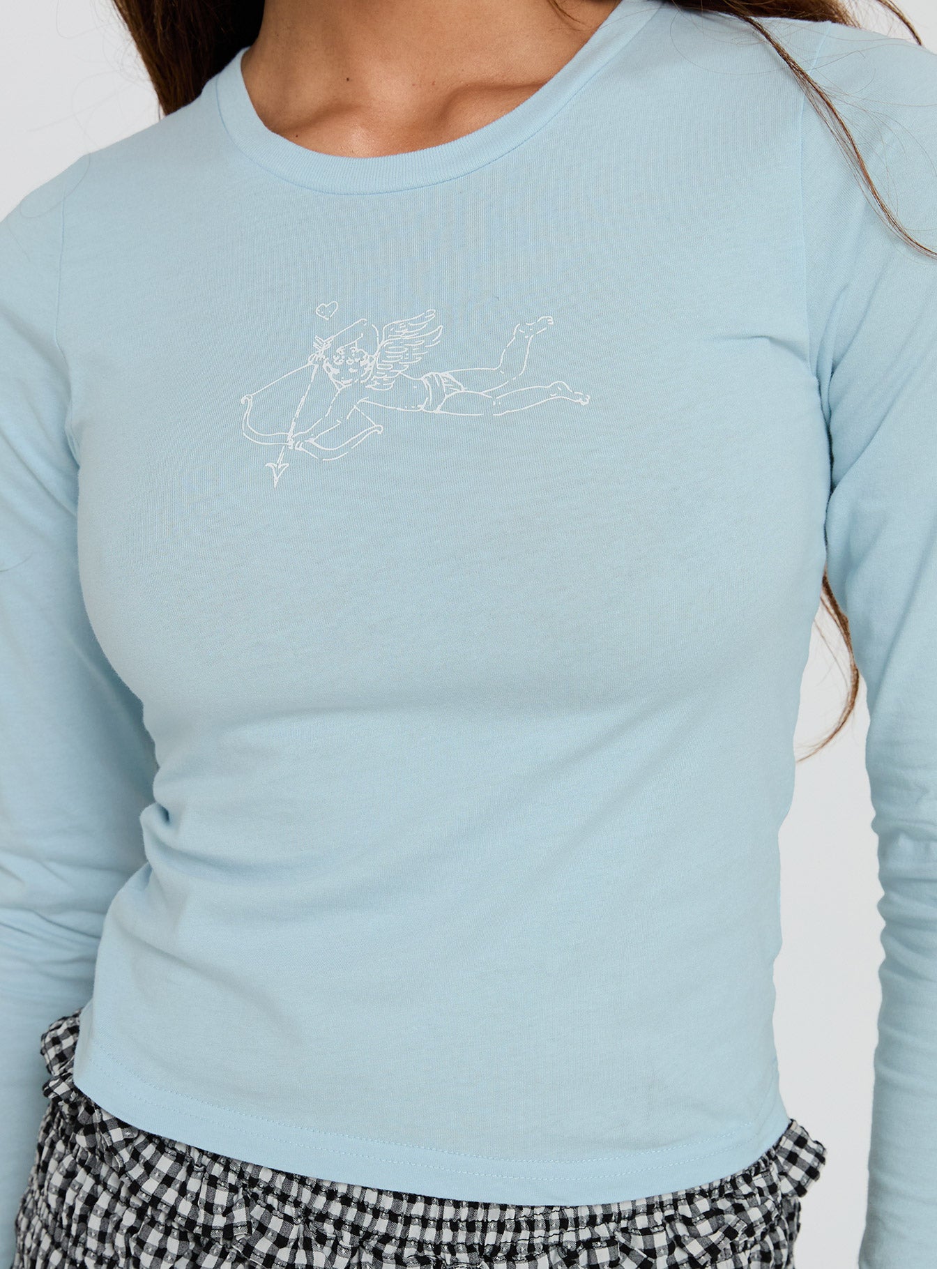 back view of model wearing Princess Polly Baby Cupid Long Sleeve Graphic Top Washed Blue Full Sleeves Crew Neck 