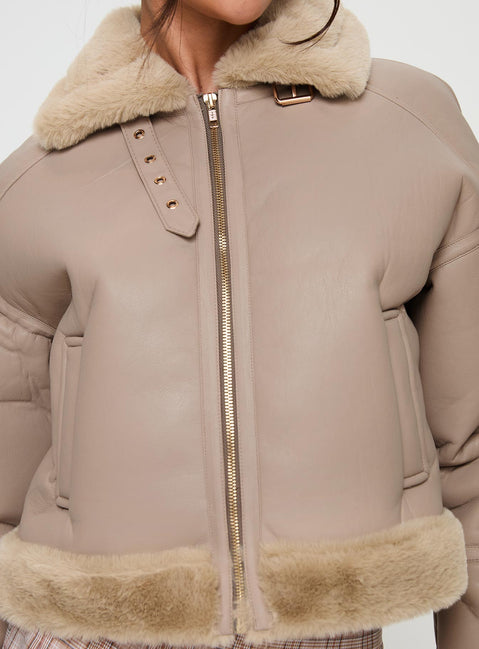 Beige Faux leather jacket Gold toned hardware, zip fastening down front, buckle fastening at neck, twin hip pockets