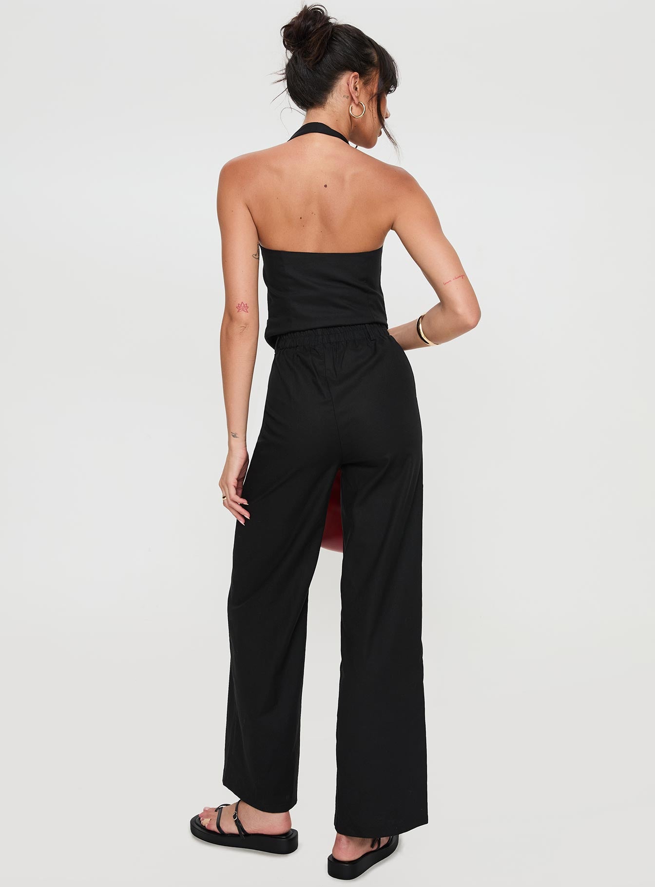 Black Matching set Vest halter style, open back, button fastening, faux twin hip pockets, elasticated waistband with belt loops, button and zip fastening