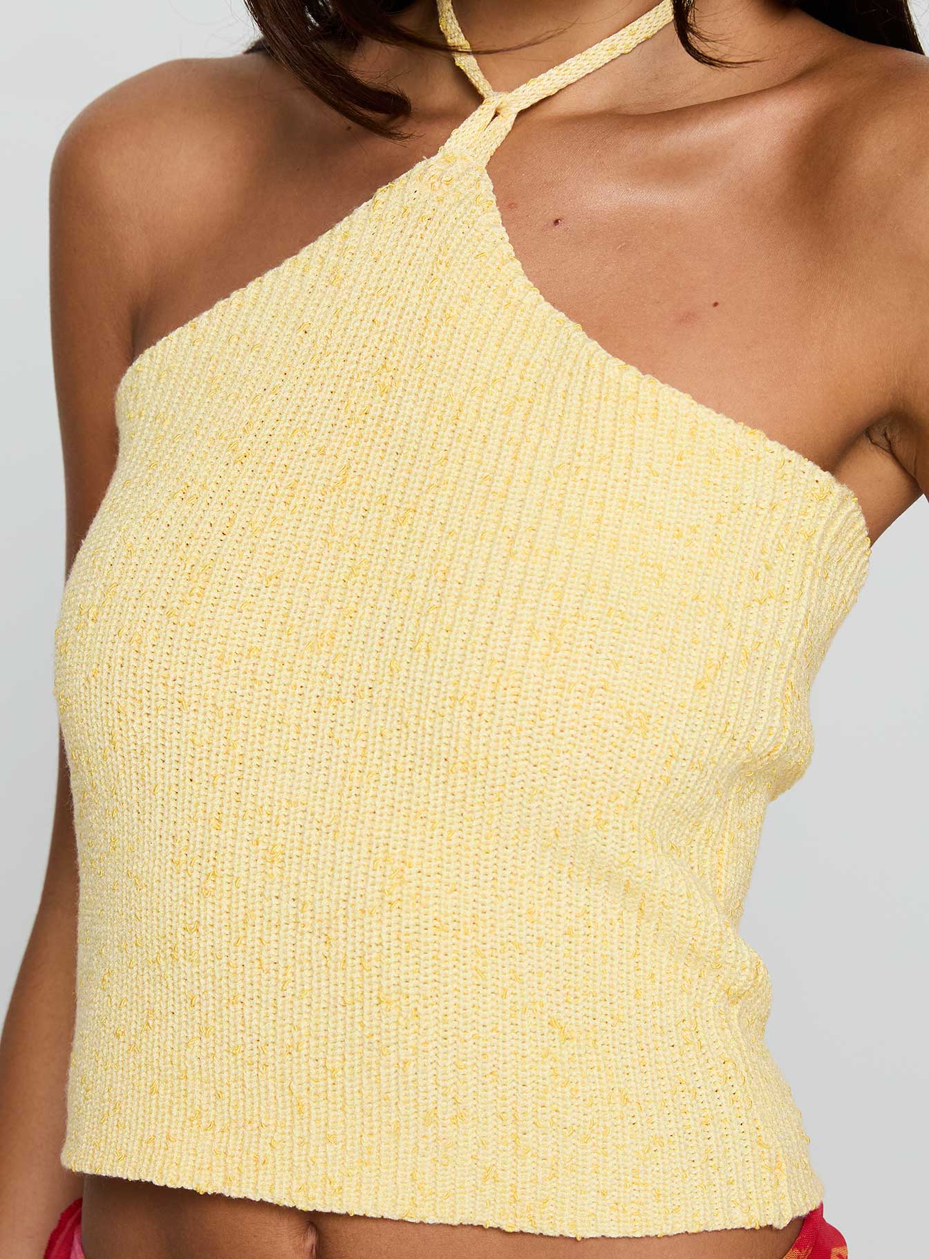 side view of model wearing Princess Polly Runaway Baby Top Lemon Sleeveless 