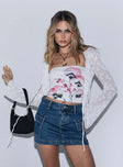   side view of model wearing Princess Polly Zakai Cargo Mini Skirt Mid Wash Denim Tall Mini Skirts 