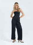 Jumpsuit Silky material Adjustable shoulder straps Lace up back Invisible zip fastening at back Wide leg