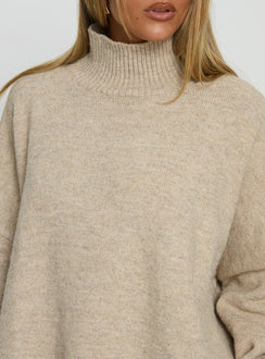 back view of model wearing Princess Polly Patrizia Funnel Neck Knit Sweater Beige 