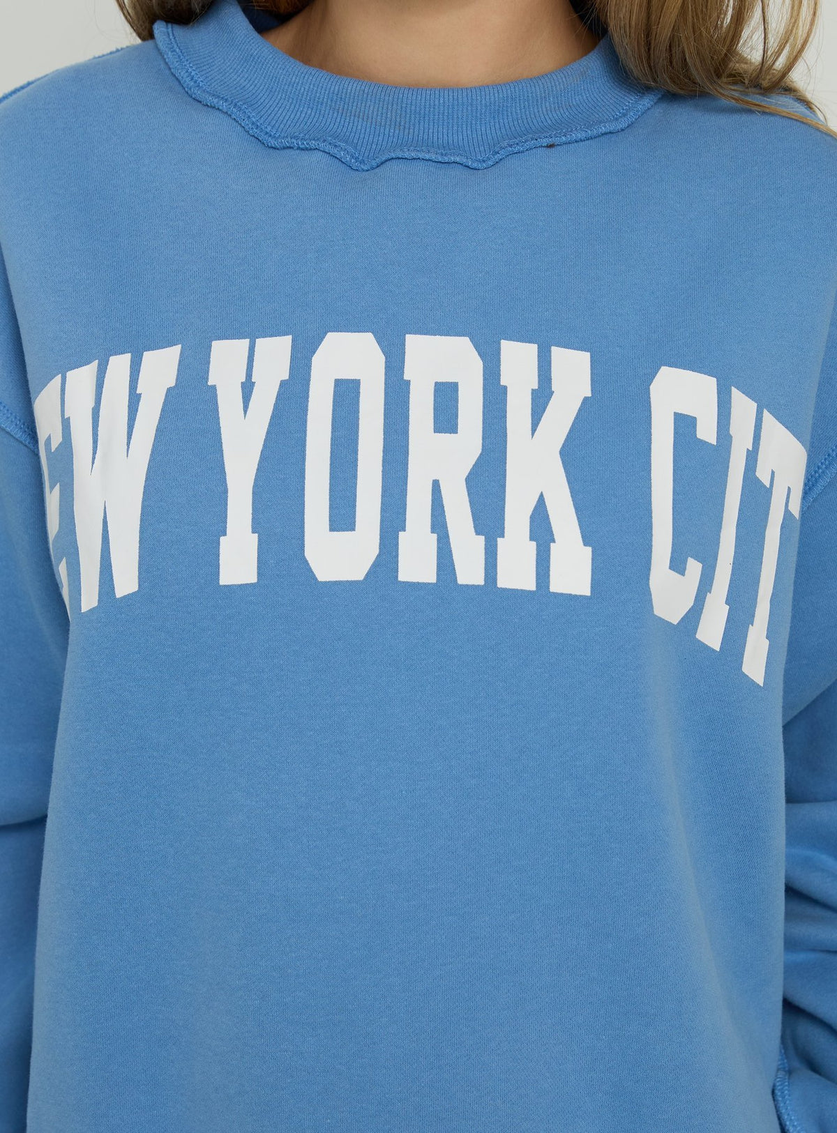 Featuring the When In New York City Oversized Jumper Blue womens jumper with long fit on-body Princess Polly