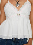 Linen top V neckline, adjustable straps, lace trim, floral detail Non-stretch material, lined bust