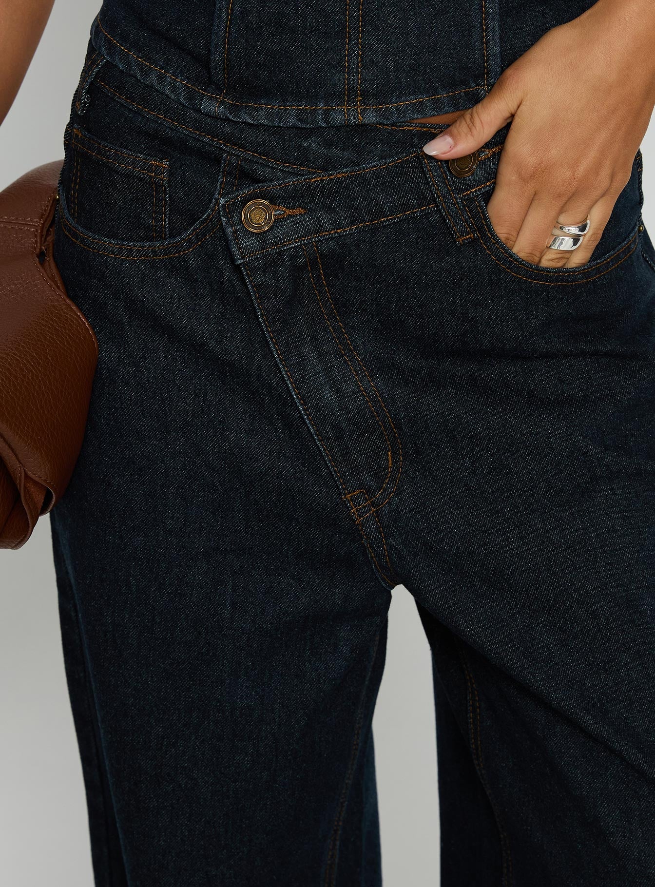 side view of model wearing Princess Polly Blue Crush Low Rise Wide Leg Jeans Indigo Mid Rise Jeans 