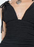 Mini dress Knit material Adjustable shoulder straps Plunging nekcline Ruched design Invisible zip fastening at back
