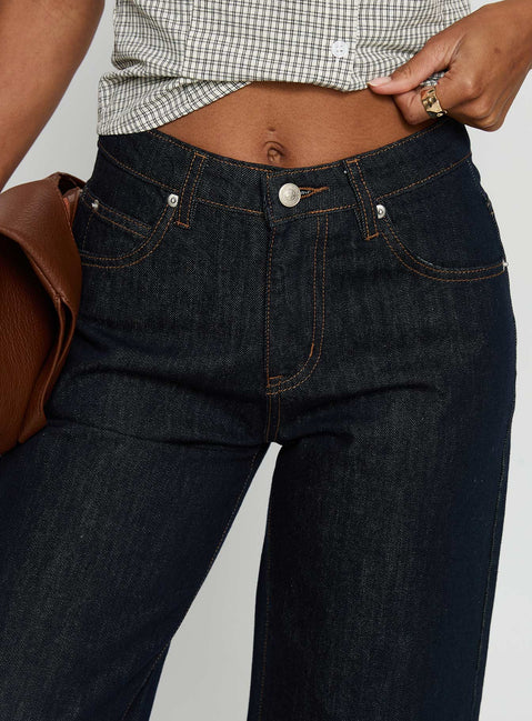 back view of model wearing Princess Polly Squire Mid Rise Straight Leg Folded Hem Jeans Indigo Wash Mid Rise Jeans 