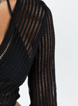 Long sleeve top Crochet knit material V neckline Tie fastening at front Sheer design